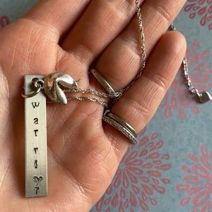 Silver Fortune cookie “warrior” necklace.